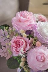 A bouquet of delicate flowers for a girl on mother's day, valentine's day in a pot. Women's day March 8.