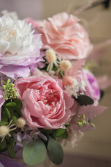 A bouquet of delicate flowers for a girl on mother's day, valentine's day in a pot. Women's day March 8.