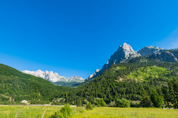 Albanian Alps view. Accursed Mountains landscape viewed from Valbona and Theth hiking trail in Albania, popular hiking trail in the Albanian Alps.