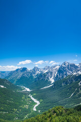 Fototapeta premium Albanian Alps view. Accursed Mountains landscape viewed from Valbona and Theth hiking trail in Albania, popular hiking trail in the Albanian Alps.