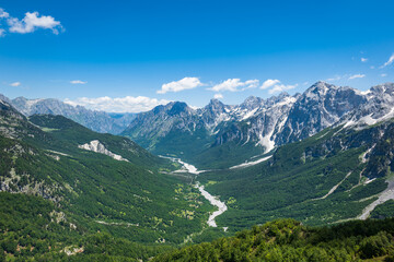 Albanian Alps view. Accursed Mountains landscape viewed from Valbona and Theth hiking trail in Albania, popular hiking trail in the Albanian Alps.