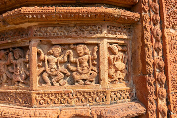 Famous terracotta (fired clay of a brownish-red colour, used as ornamental building material) relief artworks at Madanmohan Temple, Bishnupur, West Bengal, India. UNESCO heritage site of India.