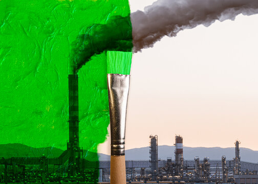 brush painting green a polluting industry with a smoke coming out of a chimney