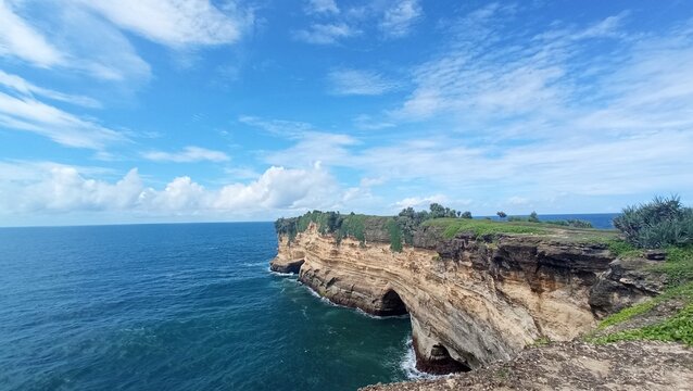 a rock in the sea south of the island of Java, Indonesia