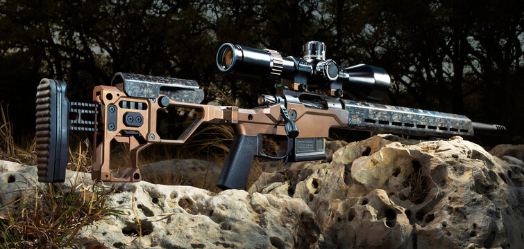 Precision rifle with rifle scope outdoors