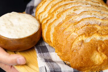 Yeast-free sourdough bread. Healthy organic rustic bread. Close up, selective focus