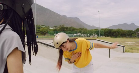 Two trendy young active diverse friends celebrating with a fist bump at skate park. Skilled skater wearing roller skates and showing her tricks to her supportive friend. Couple motivating each other - Powered by Adobe