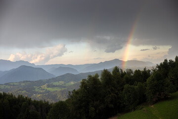 Bad Weather with Rainbow Over Slovene Beautiful Countryside Landscape
