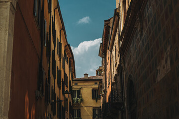 Beautiful old buildings on Verona street, Italy. Amazing blue sky.