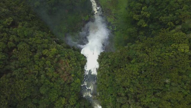 Beautiful Waterfall among Lush Dense Greenery. Aerial View