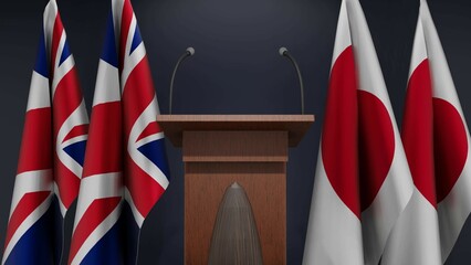 Flags of United Kingdom and Japan at international meeting or negotiations press conference. Podium speaker tribune with flags and coat arms. 3d rendering