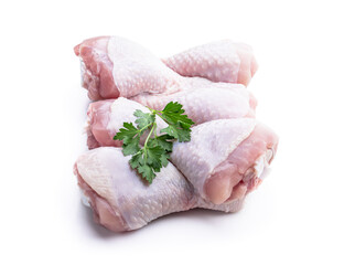 Raw chicken legs isolated on white