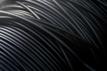 Close-up photo of black fiber optic cable