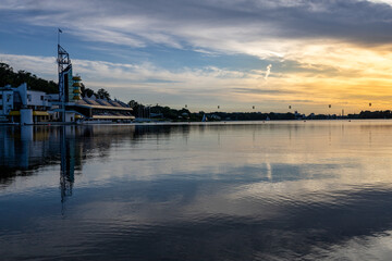  sunset by the Malta lake in Poznan. view from above the water. golden hour
