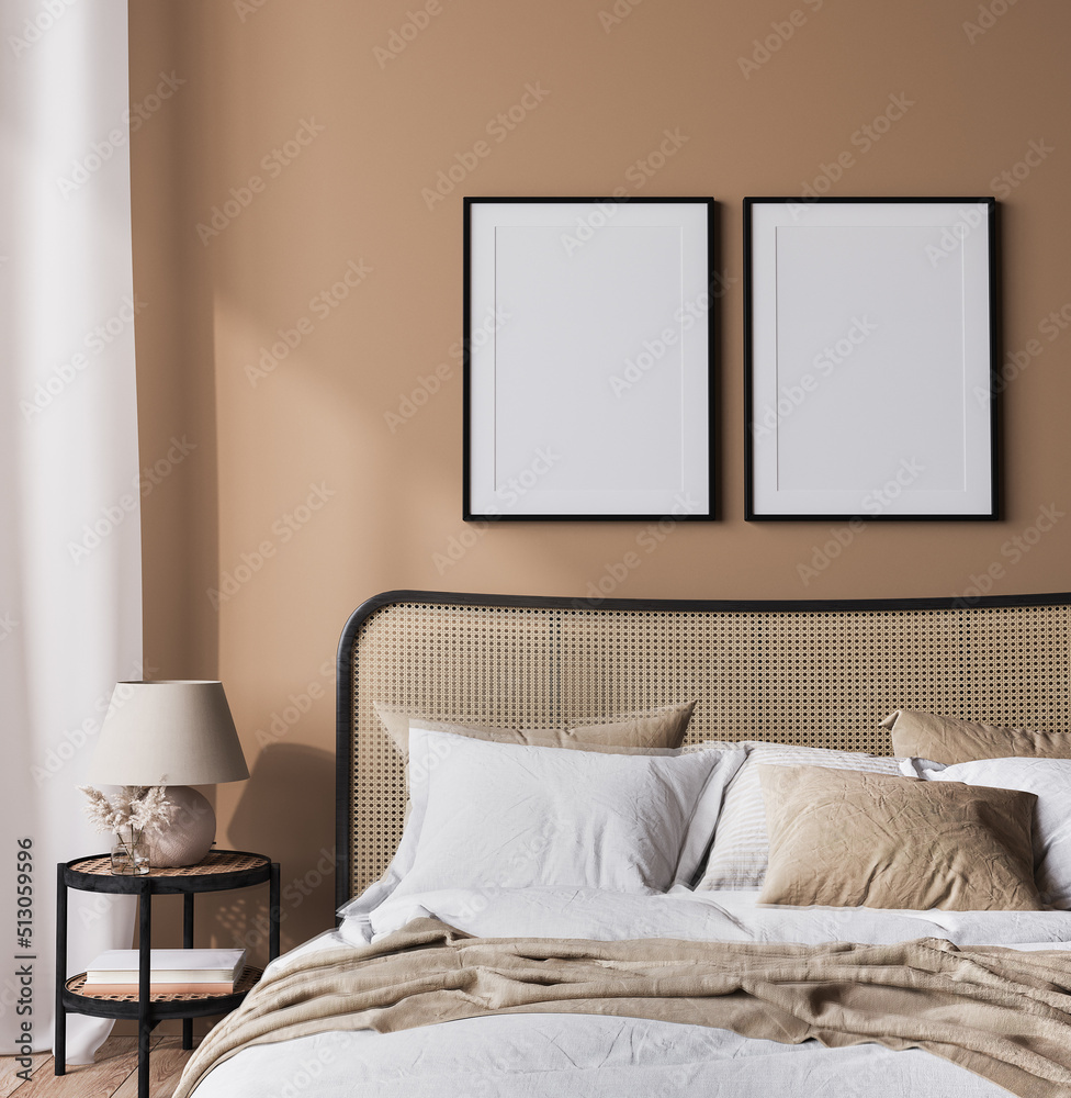 Wall mural Bright bedroom mockup, rattan wooden bed in a beige background, black frame mock up in a neutral colors room interior, 3d render