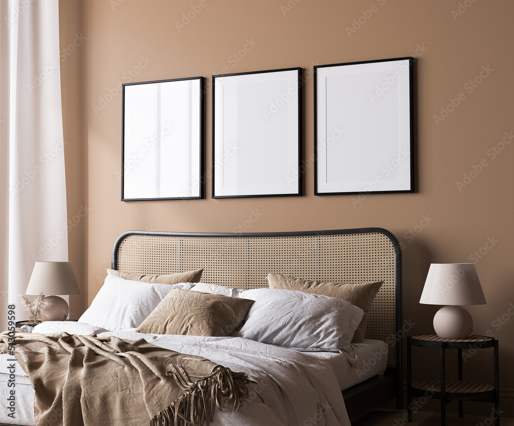 Wall mural bright bedroom mockup, rattan wooden bed in a beige background, poster frame mock up in a neutral co