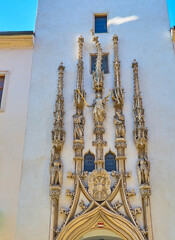 The stone portal with curved pinnacles is the masterpiece of Moravian decorative art, Brno, Czech...