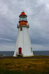 Fototapeta na wymiar Port richie lighthouse in Port au choix, Newfoundland, Canada
