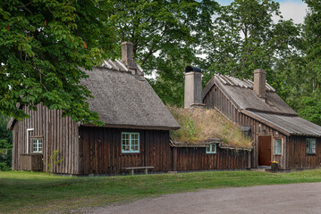 Fototapeta na wymiar Karlstorpsstugan is an old thatched cottage where the swedish king Charles XII spent one night