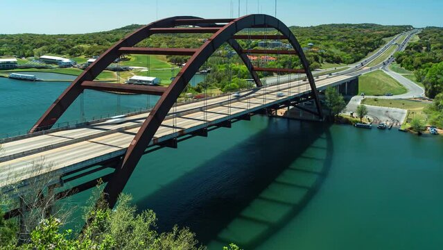Timelapse of Pennybacker Bridge - 360 Bridge - in Austin Texas on a sunny spring day
