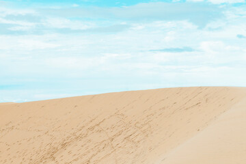 Sand dunes in Jericoacoara Ceará Brazil..Tourist and paradisiacal place with clean and beautiful skies..Vacation concept. Travel concept. Copy space.