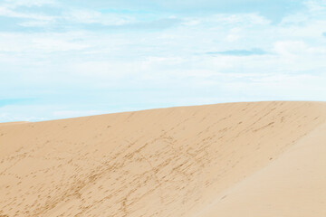 Sand dunes in Jericoacoara Ceará Brazil..Tourist and paradisiacal place with clean and beautiful skies..Vacation concept. Travel concept. Copy space.