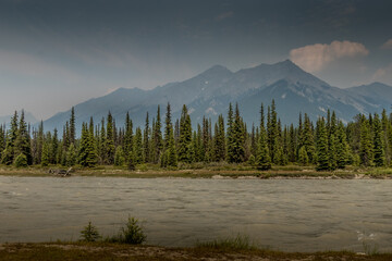 Kootney river under smoke haze sky Kootenay National Park British Columbia Canada