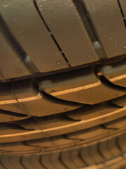 detail of a car wheel design indicating safety and grip on the road