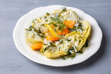 A dish with olive oil from Turkish Aegean cuisine; artichoke dish with rice and olive oil (Turkish name; zeytinyagli enginar)