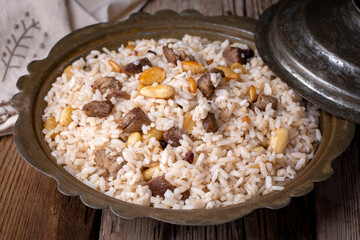 Traditional delicious Turkish food; rice pilaf with pine nuts and currants (Turkish name; bademli...