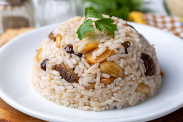 Traditional delicious Turkish food; rice pilaf with pine nuts and currants (Turkish name; bademli ic pilav or pilaf)