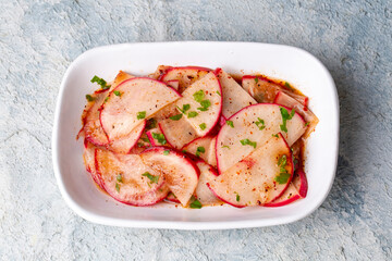 Turkish appetizers; sliced radish appetizer with sour, Turkish name; Turp mezesi