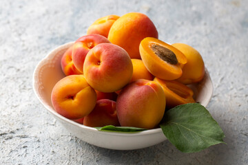 Fresh apricot fruit on the wooden background