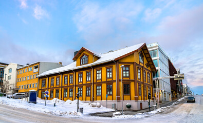 Fototapeta na wymiar Traditional architecture of Tromso in winter in Polar Norway