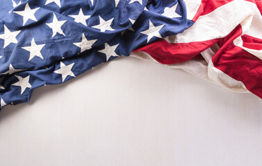 Happy Independence day concept made from American flag on white wooden background.