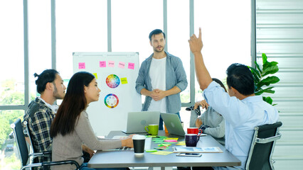 Businessman presenting business plan information to team at office meeting, Creative man leader...