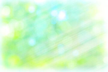 ボケた緑の背景に光