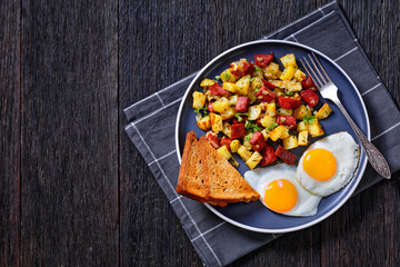 Corned Beef Hash Browns with fried eggs, top view