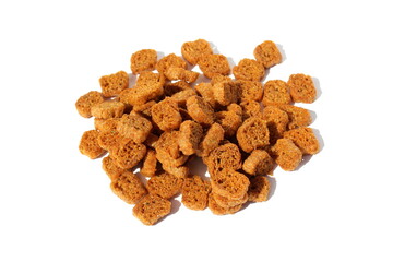 A pile of brown crackers on a white isolated background.