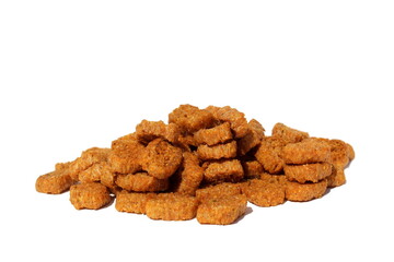 Heap of brown crackers on a white isolated background.