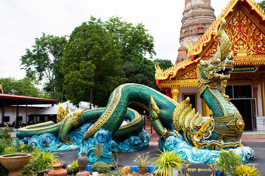Ancient naga or antique naka statue of Wat Phra Kaew temple for thai people traveler travel visit and respect praying and blessing holy mystery worship at Chainat on May 27, 2020 in Chai Nat, Thailand