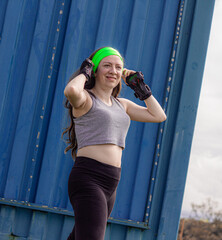 young sporty woman practicing inline skating in an urban setting