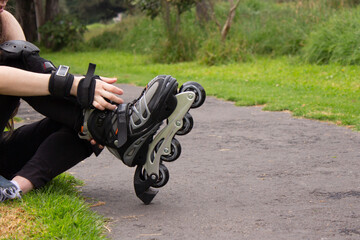 young sporty woman practicing inline skating in an urban setting