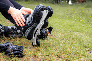 young sporty woman practicing inline skating in an urban setting
