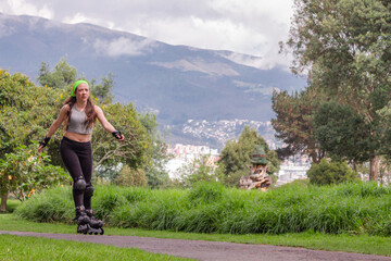young sporty woman practicing inline skating in an urban setting