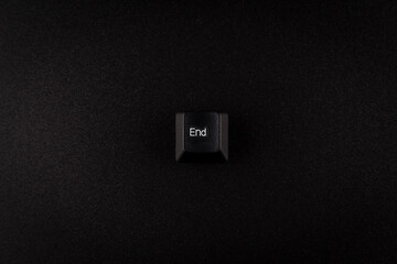 End button on black background