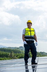 Engineer working setup Solar panel at the roof top. Engineer or worker work on solar panels or solar cells on the roof of business building