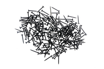 Black construction screws on wood on a white isolated background