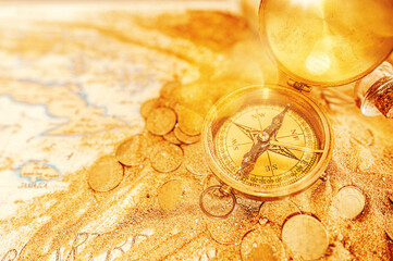 Treasure map with compass and gold coins