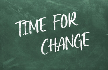 Obraz premium Time For Change written on the green chalkboard